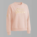 Nachhaltiger und weicher GOTS-Damensweater aus 100% Biobaumwolle, Farbton Dusty rose, mit, großeredel schimmernde Frontstickerei mit Schriftzug "Time to shine", Logostickerei am rechten Ärmel: Logo der spirituellen Modemarke Leitstern